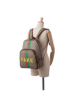 Gucci Medium GG Supreme Fake/Not Backpack Brown