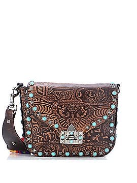 Valentino Garavani Rolling Rockstud Crossbody Bag Santeria Embossed Leather with Cabochons Small (view 1)