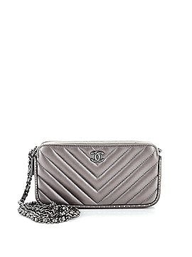 Chanel Double Zip Clutch with Chain Chevron Lambskin with Studded Detail (view 1)