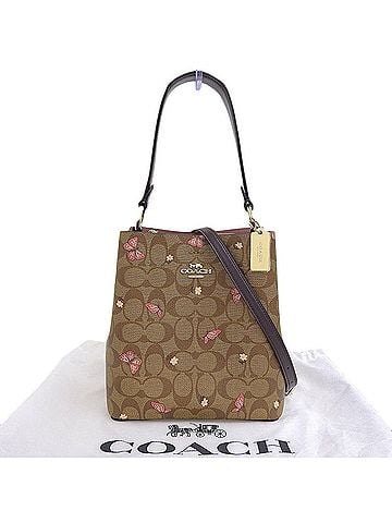 Coach Brown Coated Canvas Handbag (view 1)