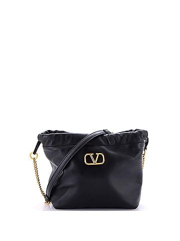 Valentino Garavani VLogo Drawstring Bucket Bag Leather Mini (view 1)