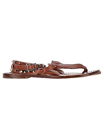 Mario Valentino  Valentino Garavani Rockstud T-Strap Flat Sandals in Brown Leather (view 1)