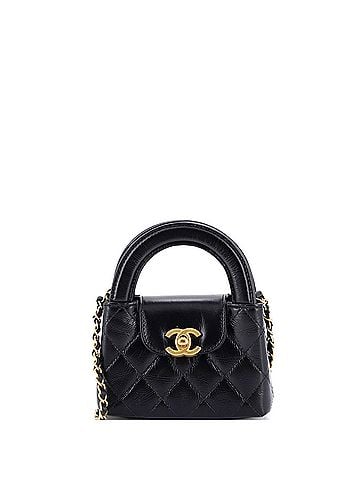 Chanel Kelly Top Handle Shopping Bag Quilted Shiny Aged Calfskin Nano (view 1)