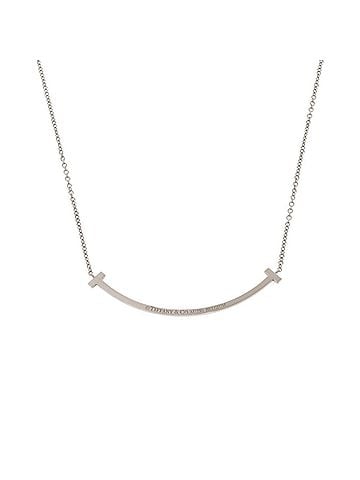 Tiffany & Co. Excellent condition Tiffany T Smile small necklace in 18K white gold with sapphire and 750 gold. Item number 1416. (view 2)