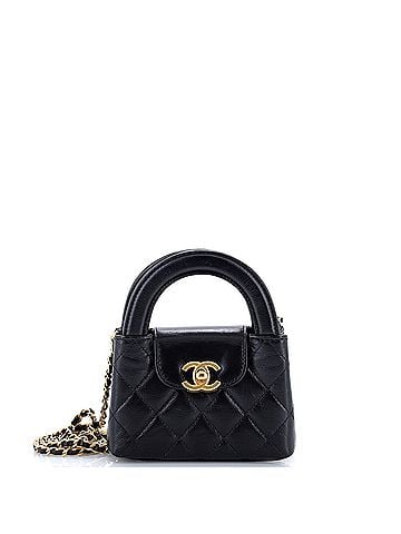 Chanel Kelly Top Handle Shopping Bag Quilted Shiny Aged Calfskin Nano (view 1)