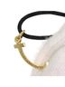 Tiffany & Co. 100% 18k Yellow Gold Yellow Tiffany T Smile Mini Cord Bracelet in 18K Yellow Gold for Women One size - photo 9