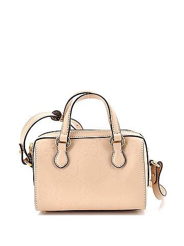 Gucci Convertible Top Handle Bag Jumbo GG Embossed Leather Mini (view 1)