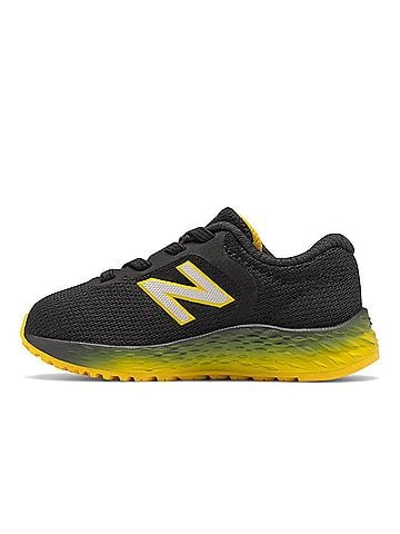 New Balance Toddlers' Arishi V2 Sneaker in Black/Yellow (view 2)