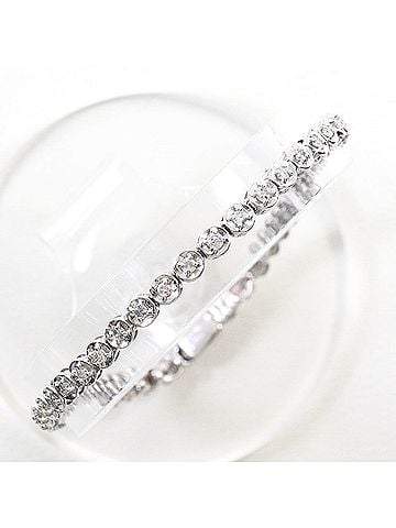 Unbranded 18K (18-karat white gold) bracelet with diamonds (carat weight not stamped), total 6.3g, 19cm length, jewelry. (view 1)