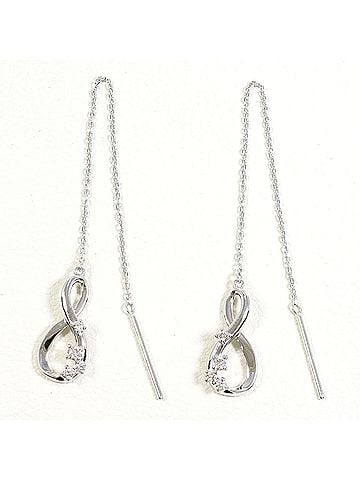 Unbranded 18K (18-karat white gold) earrings with diamonds (carat mark not specified), total weight 1.2g, jewelry. (view 1)