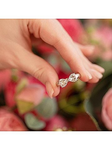 Starlette Women's Bow Ring With Heart Cubic Zirconia Stones in Silver (view 2)