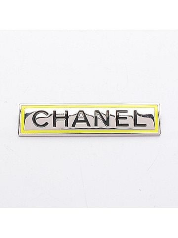 Chanel Chanel logo plate brooch accessory, stainless steel, women's, silver/yellow tones. (view 1)