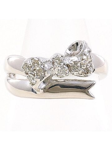 Unbranded 18K (18-karat white gold) ring with a 0.20ct diamond, includes certificate of authenticity, and weighs 3.5g. (view 1)