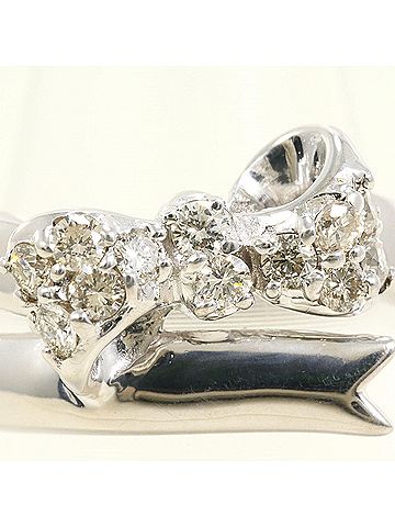 Unbranded 18K (18-karat white gold) ring with a 0.20ct diamond, includes certificate of authenticity, and weighs 3.5g. (view 2)