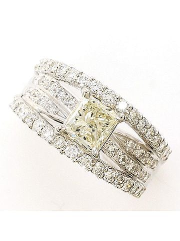 Unbranded PT900 Platinum Ring, 1 Yellow Diamond 1.007ct, 0.70ct, VS2 Clarity, Certificate of Authenticity, Total Weight 9.6g, Like New Condition. (view 1)