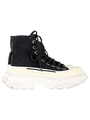 Alexander McQueen  Alexander Mcqueen Tread Slick High-Top Sneakers in Black Canvas (view 1)