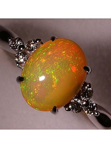 Unbranded 18K (18-karat white gold) ring, with 1.00ct opal and 0.10ct diamonds, total weight 2.5g, like new. (view 2)