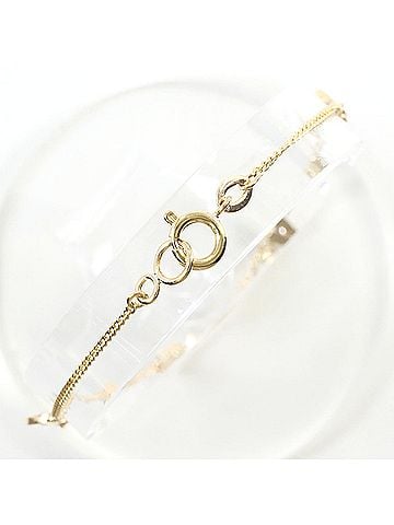 Unbranded 18K (18-karat) yellow gold bracelet with diamonds (no carat markings). Total weight 1.9g. 19.5cm. Like new condition. (view 2)