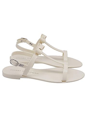 Stuart Weitzman Stuart Weitzman Mellie Bow Jelly Flat Sandals In White Rubber (view 1)