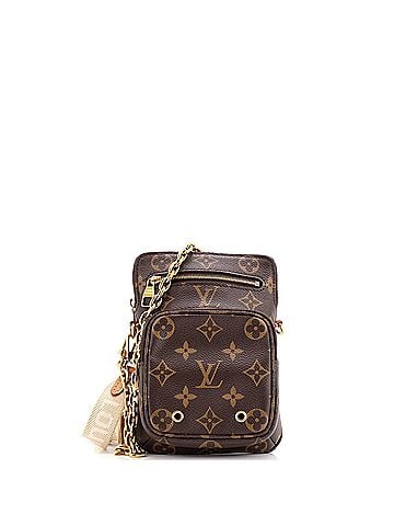 Louis Vuitton Utility Phone Sleeve Bag Monogram Canvas (view 1)