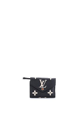 Louis Vuitton Victorine Wallet Bicolor Monogram Empreinte Giant (view 1)