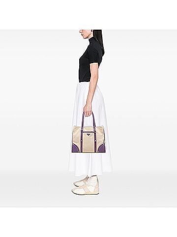 Prada Studded Leather Trimmed Canvas Front Pocket Tote (view 2)