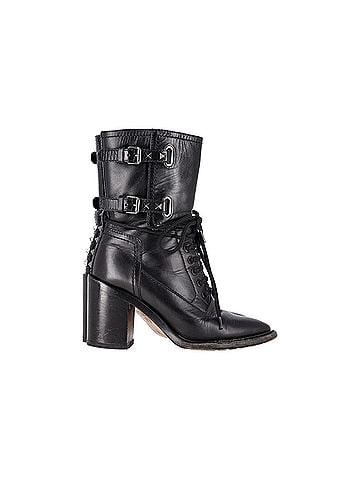 Mario Valentino Valentino Garavani Rockstud Double-Buckle Heeled Boots in Black Leather (view 1)