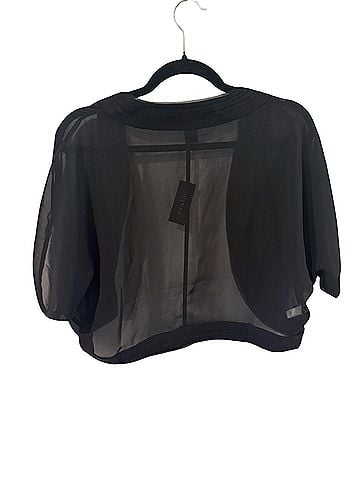 White House Black Market Shrug (view 2)