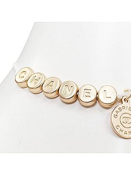 Chanel Chanel gold tone logo letter bead charm thread lucky bracelet (view 1)