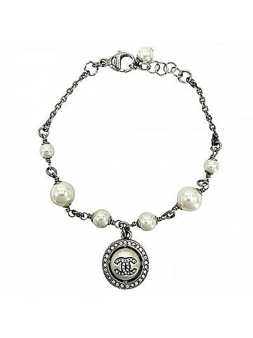 Chanel Chanel bracelet for women, featuring the Coco Mark design, adjustable clasp, faux pearls, rhinestones, D19K gold, silver, white, approximately 8.5g, 2019 model. (view 1)