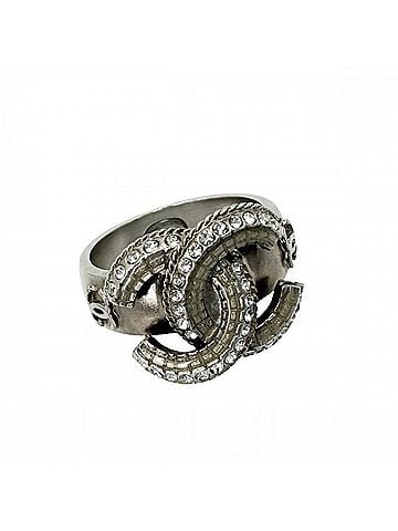 Chanel Chanel ring for women, featuring the Coco Mark and rhinestones. Approximately 14K gold, weighing approximately 5.6g. 2014 model. (view 1)