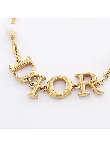 Christian Dior Christian Dior Dior logo bracelet, gold plated (GP), faux pearl, women's, gold/white tones. (view 2)