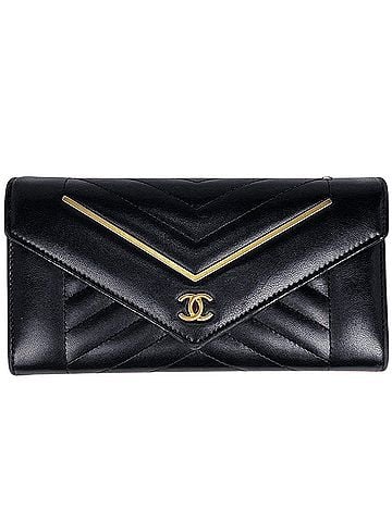 Chanel Chanel V-stitch bi-fold long wallet, chevron Coco mark, leather, black, women's. (view 1)