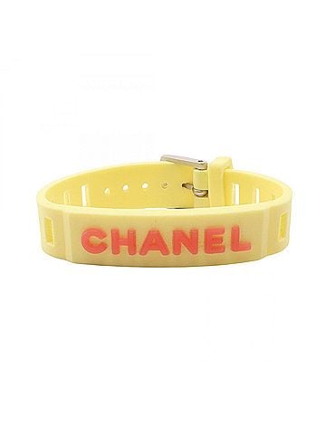 Chanel Chanel rubber band bracelet accessory for women, available in yellow and orange tones. (view 1)
