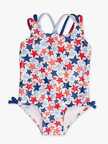 Ruffle Butts Girl's Shimmer Star-Spangled Cross-Back Swimsuit in Blue (view 1)