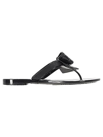 Salvatore Ferragamo Ferragamo Bow-Embellished Thong Slide Sandals in Black Rubber (view 1)
