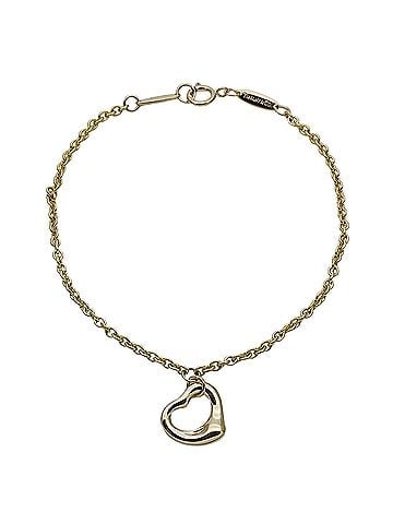 Tiffany & Co. Tiffany &amp; Co. women's bracelet, brand name, 750YG, Elsa Peretti open heart design, yellow gold jewelry. (view 2)