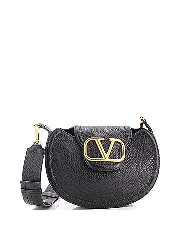 Valentino Garavani VLogo Saddle Crossbody Bag Leather Medium (view 1)