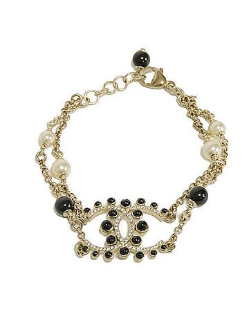Chanel Chanel bracelet with Coco Mark, crystal chain, pearl, black stone, rhinestone, gold G19V CC mark, ivory, for women. (view 1)