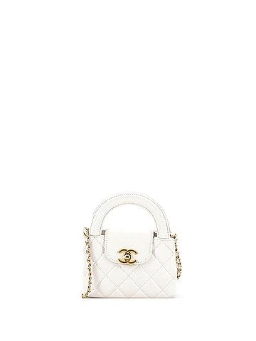 Chanel Kelly Top Handle Shopping Bag Quilted Shiny Aged Calfskin Nano (view 1)