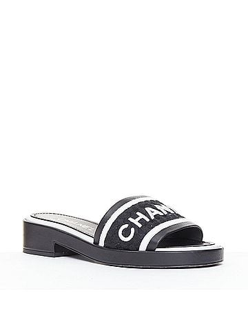 Chanel Chanel black white logo embroidered lambskin heeled mules (view 1)