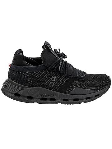 On Cloud Black athletic shoe with a mesh upper and Cloudtec sole. Sneakers (view 1)