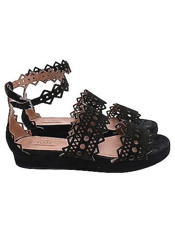 Alaïa Alaïa Laser Cut Open Toe Flat Sandals in Black Suede (view 1)