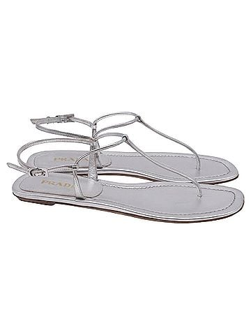 Prada Prada T-Strap Flat Sandals in Metallic Silver Leater (view 1)