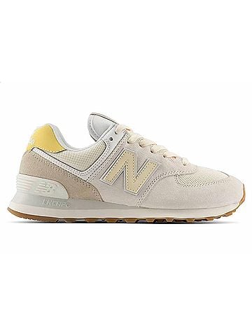 New Balance Women's 574 Sneaker in Sea Salt Yellow (view 1)
