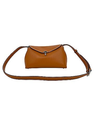 Totême Totême T-Lock Grained-Leather Clutch in Tan Brown Leather (view 1)
