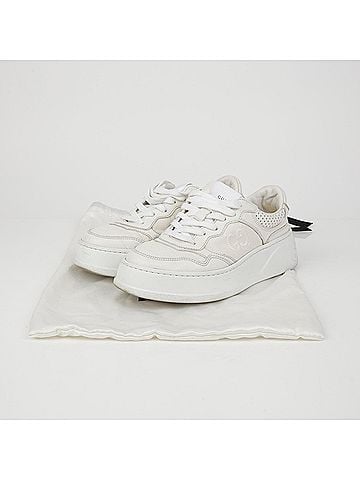 Gucci Gg Embossed Sneakers (view 1)