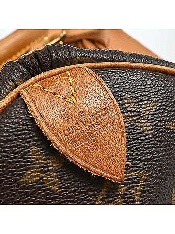 Louis Vuitton Keepall Monogram Canvas Brown Canvas Travel Bag Bag (view 2)
