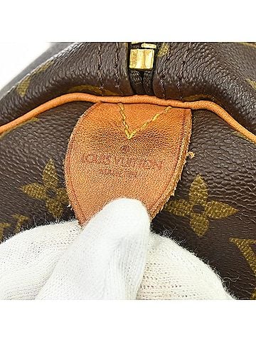 Louis Vuitton Keepall Monogram Canvas Brown Canvas Travel Bag Bag (view 2)