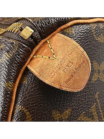 Louis Vuitton Keepall Monogram Canvas Brown Canvas Travel Bag Bag (view 2)